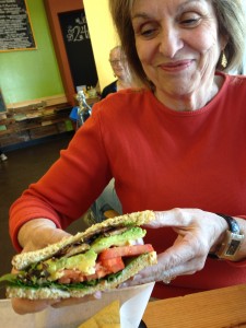 my mom about to sink her teeth into the blt